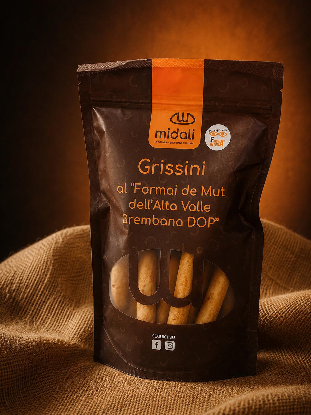 https://www.panificiomidali.com/wp-content/uploads/2026/06/grissini-formai-de-mut-1.jpeg